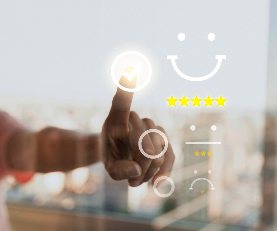 Hand selecting a five-star satisfaction rating on a digital interface