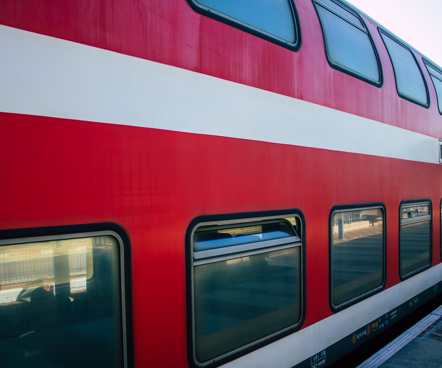 Part of a train in colors red and white